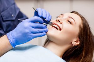 The patient is relaxed and comfortable during the dental procedure.