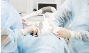 An ongoing dental implant surgery inside a dental clinic.